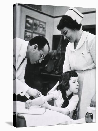 Jonas E. Salk Inoculating Child with Polio Vaccine He Developed, Ca. 1955-null-Stretched Canvas