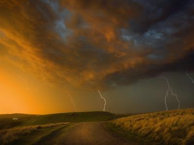 Thunderstorm and Orange Clouds at Sunset