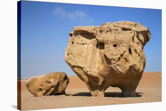 Jordan, Wadi Rum. a Free-Standing Sandstone Feature known as the Bedouin Cow in Wadi Rum.-Nigel Pavitt-Stretched Canvas