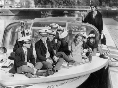 https://imgc.allpostersimages.com/img/posters/josephine-baker-1906-1975-and-her-children-on-a-boat-in-amsterdam-on-october-5-1964_u-L-PWGMFL0.jpg?artPerspective=n