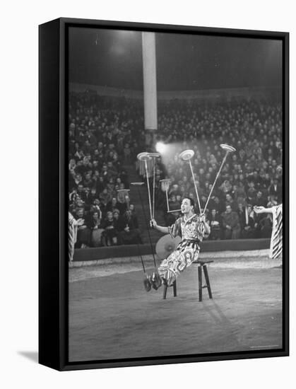 Juggler Spinning Seven Plates at Once-Thomas D^ Mcavoy-Framed Stretched Canvas