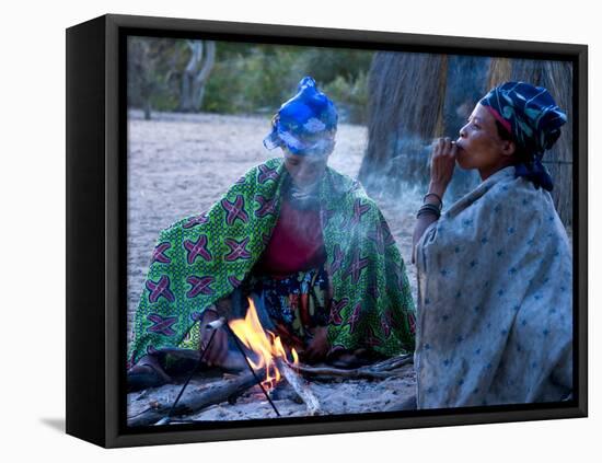 Jul'Hoan !Kung Bushman, Two Women Smoke around Fire in Village, Bushmanland, Namibia-Kim Walker-Framed Stretched Canvas