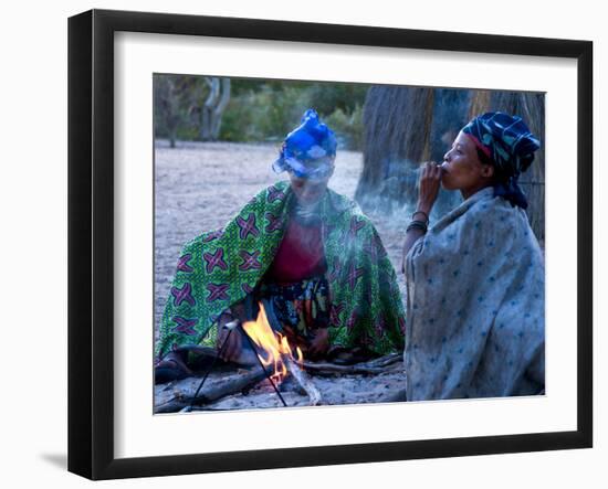 Jul'Hoan !Kung Bushman, Two Women Smoke around Fire in Village, Bushmanland, Namibia-Kim Walker-Framed Premium Photographic Print
