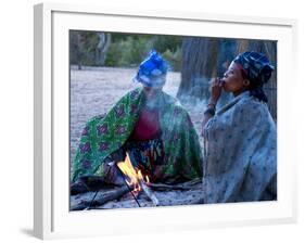 Jul'Hoan !Kung Bushman, Two Women Smoke around Fire in Village, Bushmanland, Namibia-Kim Walker-Framed Photographic Print