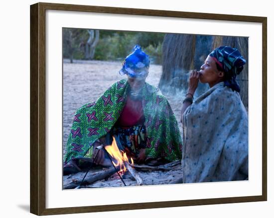 Jul'Hoan !Kung Bushman, Two Women Smoke around Fire in Village, Bushmanland, Namibia-Kim Walker-Framed Photographic Print