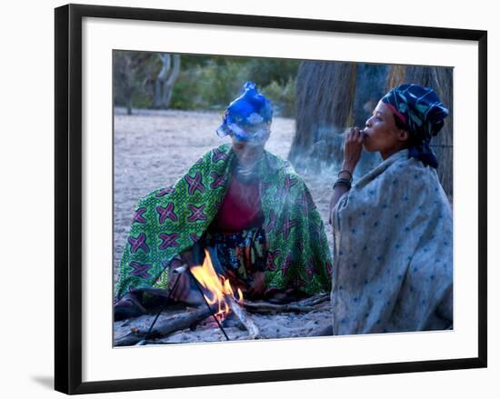 Jul'Hoan !Kung Bushman, Two Women Smoke around Fire in Village, Bushmanland, Namibia-Kim Walker-Framed Photographic Print