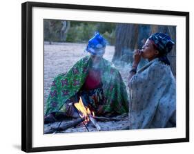 Jul'Hoan !Kung Bushman, Two Women Smoke around Fire in Village, Bushmanland, Namibia-Kim Walker-Framed Photographic Print