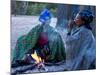 Jul'Hoan !Kung Bushman, Two Women Smoke around Fire in Village, Bushmanland, Namibia-Kim Walker-Mounted Photographic Print