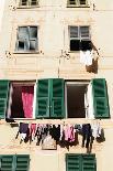 Washing hanging out of a window-Julian Castle-Photo
