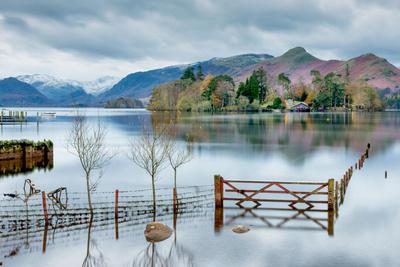 A Scenic Landscape View of Derwentwater, Winter with a Flooded Field and Gate