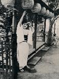 ''Three generations of women moving a cart with grandmother at the rear, pushing', c1900, (1921)-Julian Leonard Street-Photographic Print