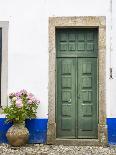 Portugal, Obidos. Pink hydrangea in terracotta pot next to a green door.-Julie Eggers-Photographic Print