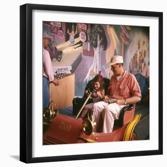 July 17 1955: Guests in the Mr Toad Wild Ride, Disneyland, Anaheim, California-Loomis Dean-Framed Photographic Print