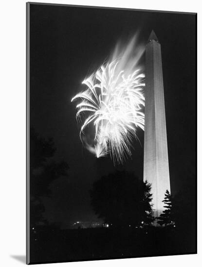July 4, 1947: View of a Fireworks Display Behind the Washington Monument, Washington DC-William Sumits-Mounted Photographic Print