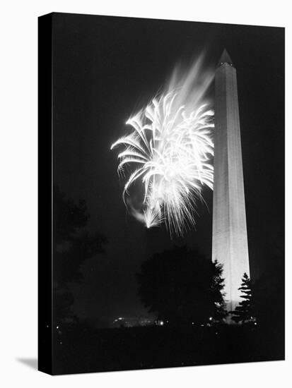 July 4, 1947: View of a Fireworks Display Behind the Washington Monument, Washington DC-William Sumits-Stretched Canvas