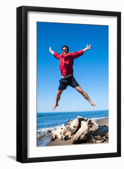 Jumping close to sea, Capalbio beach, province of Grosseto, Tuscany, Italy, Europe-Nico Tondini-Framed Premium Photographic Print