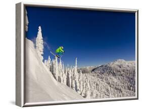 Jumping from Cliff on a Sunny Day at Whitefish Mountain Resort, Montana, Usa-Chuck Haney-Framed Photographic Print