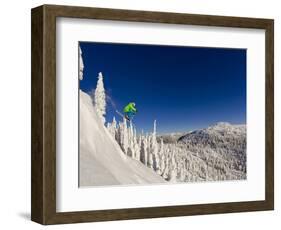 Jumping from Cliff on a Sunny Day at Whitefish Mountain Resort, Montana, Usa-Chuck Haney-Framed Photographic Print