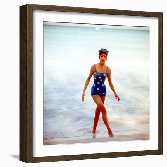 June 1956: Woman in Polka-Dot Swimsuit Modeling Beach Fashions in Cuba-Gordon Parks-Framed Photographic Print