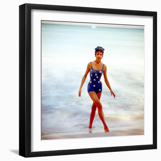 June 1956: Woman in Polka-Dot Swimsuit Modeling Beach Fashions in Cuba-Gordon Parks-Framed Photographic Print