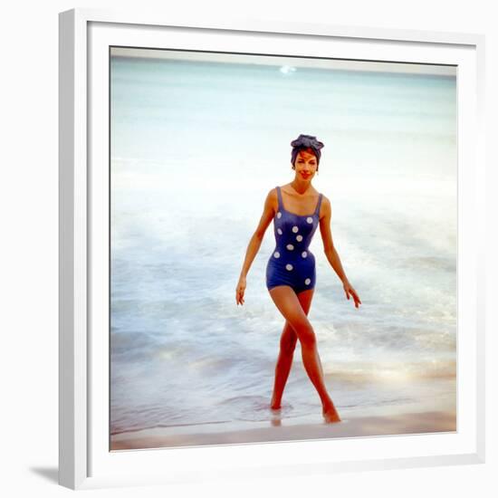 June 1956: Woman in Polka-Dot Swimsuit Modeling Beach Fashions in Cuba-Gordon Parks-Framed Premium Photographic Print