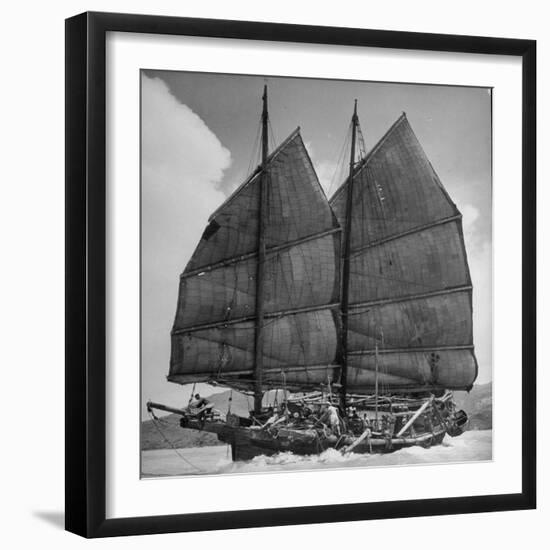 Junk Leaving Harbor with Patchwork Sails Up-Jack Birns-Framed Photographic Print