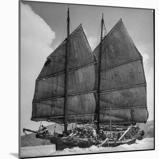 Junk Leaving Harbor with Patchwork Sails Up-Jack Birns-Mounted Photographic Print