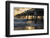 Juno Beach, Florida. Man watching high surf from the pier at Juno Beach-Jolly Sienda-Framed Photographic Print