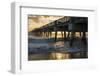 Juno Beach, Florida. Man watching high surf from the pier at Juno Beach-Jolly Sienda-Framed Photographic Print