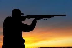 Hunter Aiming the Hunting Rifle during a Hunt at Sunrise-kadmy-Photographic Print