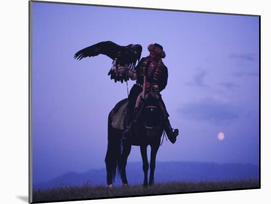 Kalanash Sarsembek with Eagle, a Hunter's Moonrise Over Steppe, Kazakhstan, Central Asia-David Beatty-Mounted Photographic Print