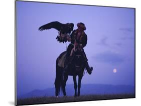 Kalanash Sarsembek with Eagle, a Hunter's Moonrise Over Steppe, Kazakhstan, Central Asia-David Beatty-Mounted Photographic Print
