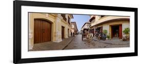 Kalesa moving along Calle Crisologo, Vigan, Ilocos Sur, Philippines-null-Framed Photographic Print