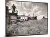 Kansas Farmer Driving Farmall Tractor as He Pulls a Manned Combine During Wheat Harvest-Margaret Bourke-White-Mounted Photographic Print