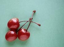 Three Cherries on a Green Background-Karen M^ Romanko-Stretched Canvas