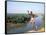 Karo Boy Leaps Off a Cliff Over the Omo River, Ethiopia-Janis Miglavs-Framed Stretched Canvas