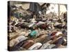 Kashmiri Eartquake Survivors Pray Amid the Debris of a Destroyed Building During the Eid Al-Fitr-null-Stretched Canvas