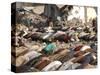 Kashmiri Eartquake Survivors Pray Amid the Debris of a Destroyed Building During the Eid Al-Fitr-null-Stretched Canvas