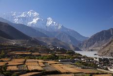 Nepal, Mustang, Kagbeni. the Soaring Peak of Nilgiri Behind the Village of Kagbeni.-Katie Garrod-Framed Stretched Canvas