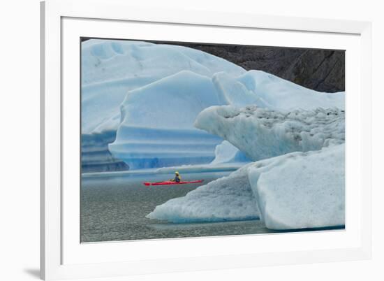 Kayaker exploring Grey Lake amid icebergs, Torres del Paine National Park, Chile, Patagonia-Adam Jones-Framed Premium Photographic Print