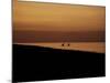Kayakers at Sunset, Indonesia-Michael Brown-Mounted Photographic Print