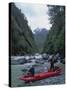 Kayakers on River, Chile-Michael Brown-Stretched Canvas