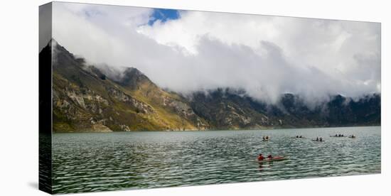 Kayaks at Quilotoa, a water-filled caldera and the most western volcano in the Ecuadorian Andes, Ec-Alexandre Rotenberg-Stretched Canvas