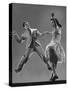 Kaye Popp and Stanley Catron Demonstrating a Step of the Lindy Hop-Gjon Mili-Stretched Canvas