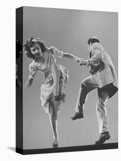 Kaye Popp and Stanley Catron Demonstrating a Step of the Lindy Hop-Gjon Mili-Stretched Canvas