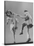 Kaye Popp and Stanley Catron Demonstrating a Step of the Lindy Hop-Gjon Mili-Stretched Canvas