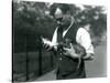 Keeper Harry Warwick Bottle Feeds a Baby Warthog at London Zoo, in August 1922-Frederick William Bond-Stretched Canvas