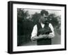 Keeper Harry Warwick Cradles a Baby Warthog in His Arms at London Zoo, August 1922-Frederick William Bond-Framed Photographic Print