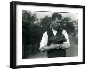 Keeper Harry Warwick Cradles a Baby Warthog in His Arms at London Zoo, August 1922-Frederick William Bond-Framed Photographic Print
