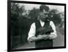 Keeper Harry Warwick Cradles a Baby Warthog in His Arms at London Zoo, August 1922-Frederick William Bond-Framed Photographic Print